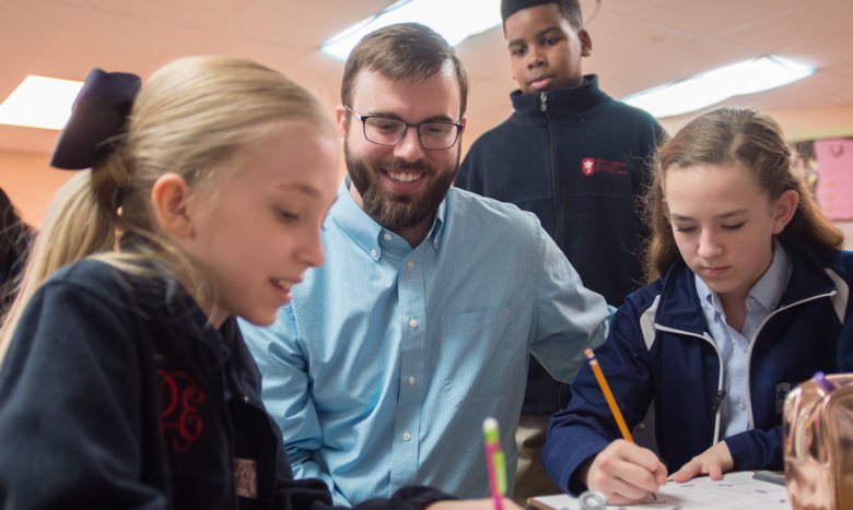 teacher with students in classroom