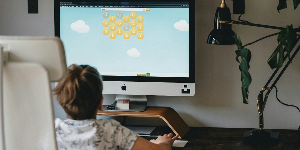 youth playing computer game