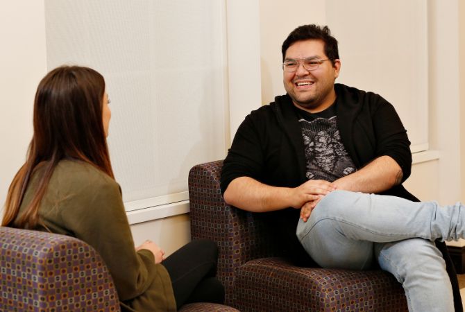 counselor talking to individual