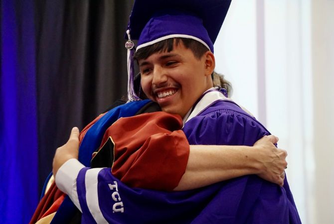 graduate smiling