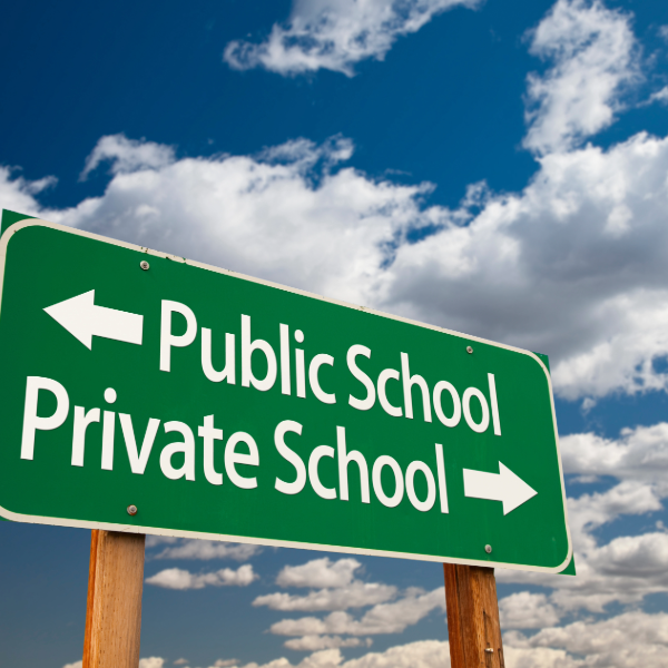 road sign with public school, private school with arrows going opposite ways