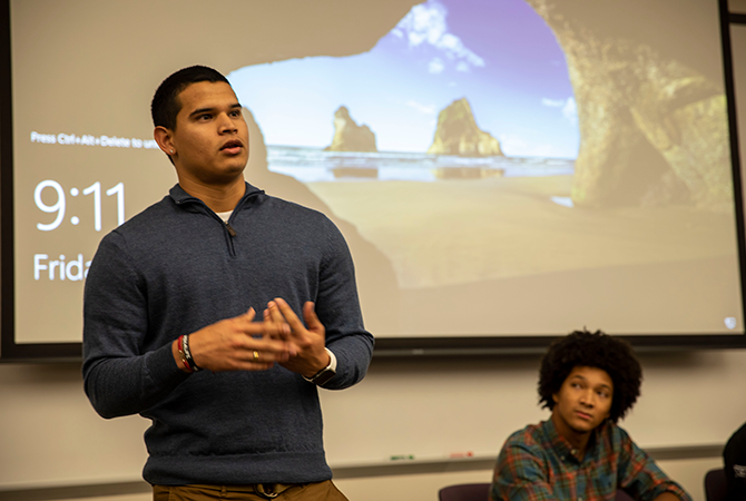 Latino student presenting
